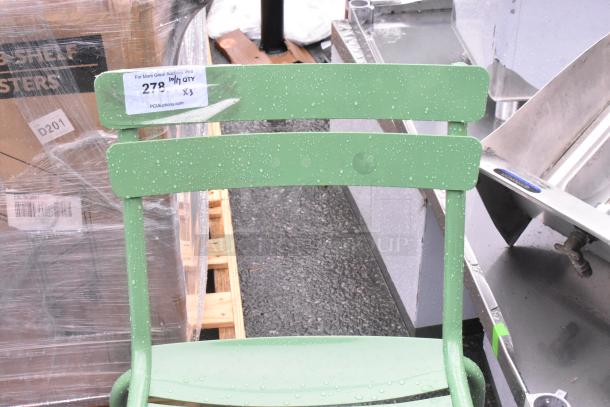 Green patio chair with minor scratches, part of a set of three. New condition. Label reads "279 MinQty x3" from PCAuctions.com.