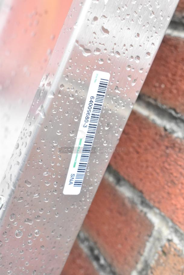 ServIt stainless steel 4-tier warming display case with visible raindrops, barcode, and Pro No. 64009680.3 label.