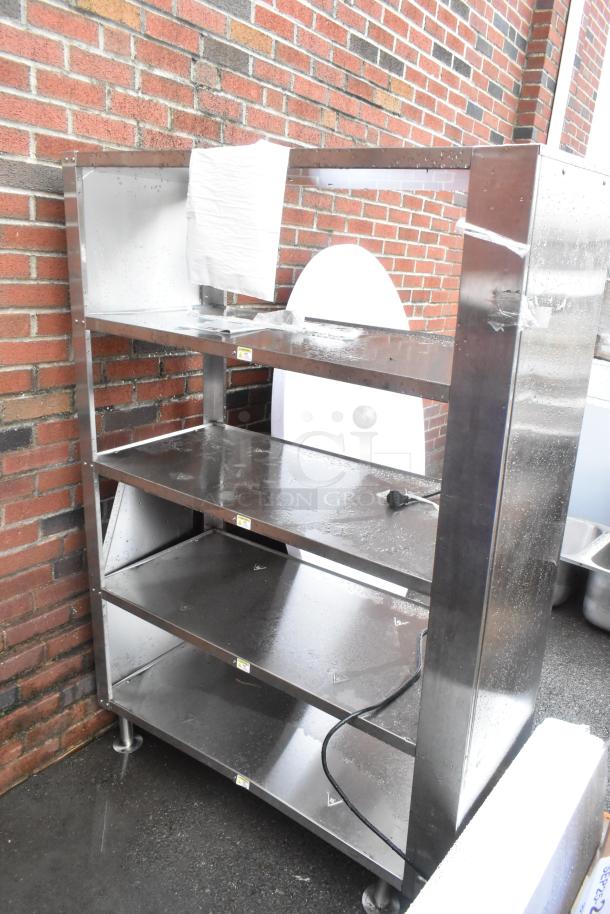BRAND NEW ServIt stainless steel 4-tier warming display case, 115 volts, 1 phase, scratch and dent condition.