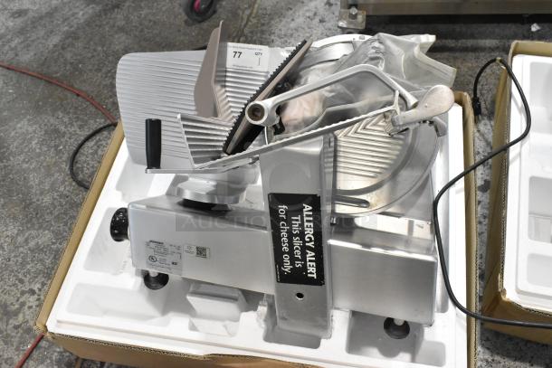 Bizerba SE 12 US metal commercial meat slicer with blade sharpener. 120 volts, 1 phase. Tested, working condition.