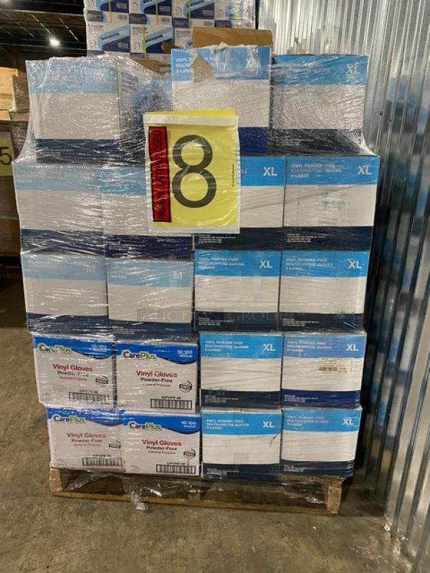 Brand new full pallet of Care Plus/Victoria Bay powder-free vinyl gloves, assorted sizes, wrapped and labeled for auction.