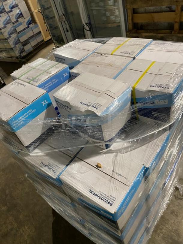 New full pallet of Care Plus/Victoria Bay commercial vinyl powder-free disposable gloves, assorted sizes, shrink-wrapped.