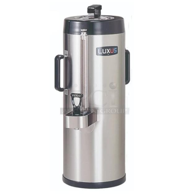 Brand new Fetco Luxus Series 1.5 Gal. stainless steel thermal coffee dispenser, model TPD-15, with Fetco logo.