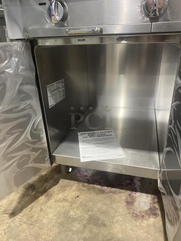 Southbend Platinum Series 48" Char Broiler, Model P48C-CCC, stainless steel, new condition, with cabinet base and backsplash.