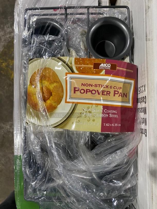 Mixed pallet of commercial kitchen items, including Amco non-stick 6-cup popover pan, wrapped in plastic.