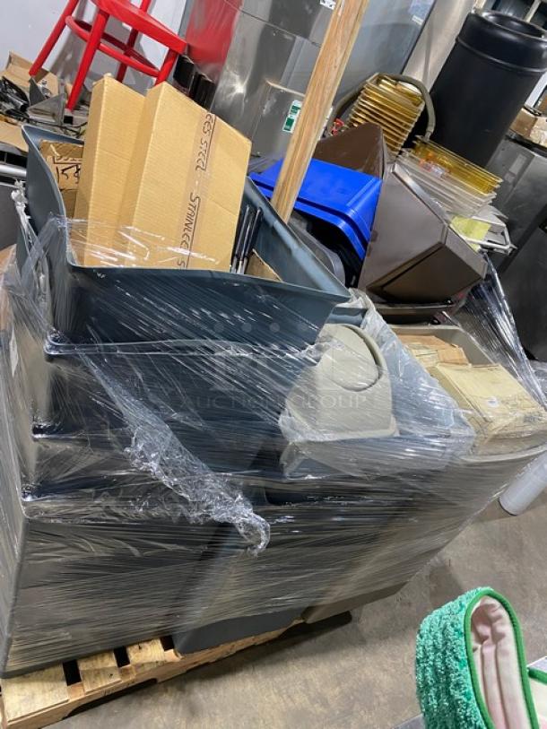 Bundle of commercial containers and lids, wrapped on a pallet. Includes Rubbermaid bins and various brand items. New condition.