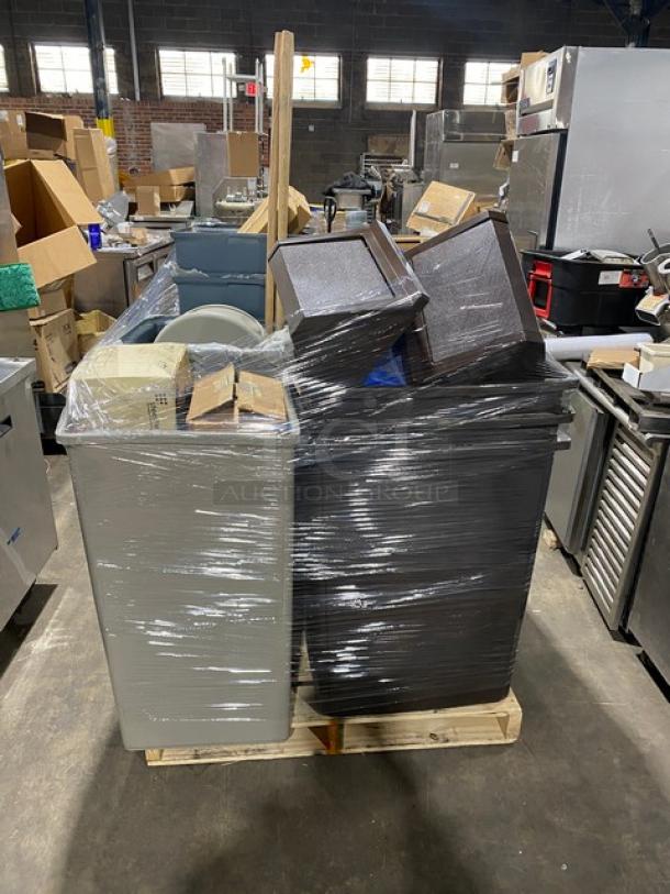 Collection of commercial waste bins and accessories including a Rubbermaid Glutton Brown 56 Gal Trash Can on a pallet. Wrapped for shipment.