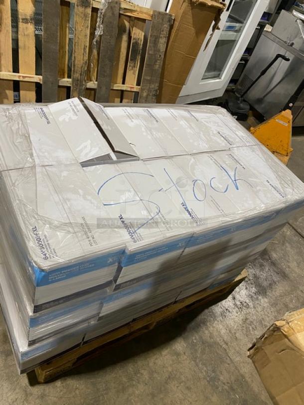 Full pallet of Victoria Bay disposable vinyl gloves, brand new and powder-free. Marked "Stock" on packaging.