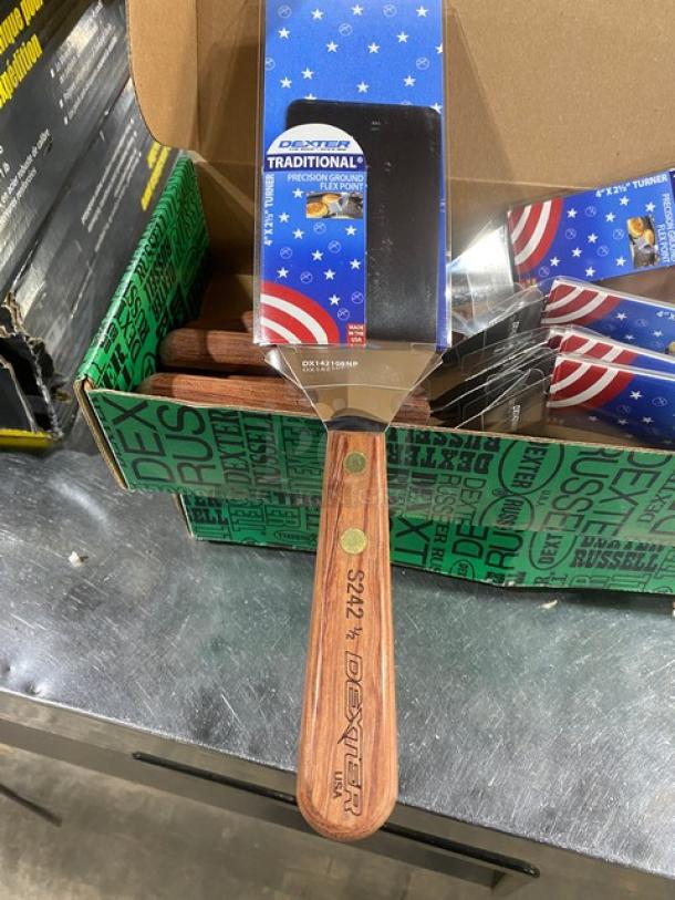 Brand new Dexter Russell S242 traditional turner, stainless steel blade 4"x2", wooden grip handle, model S242, packaged.