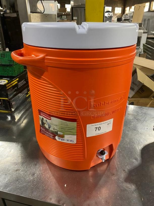 Rubbermaid 10 Gal./37.9 L orange insulated water jug, model 1610, with white screw-on lid and thumb-trigger spigot, brand new.