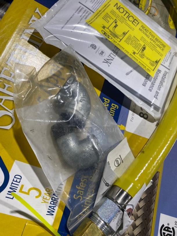 Brand new T&S Brass Safe-T-Link Series HG-6D-48 gas connector hose, 48", with tags and instructions, in package.