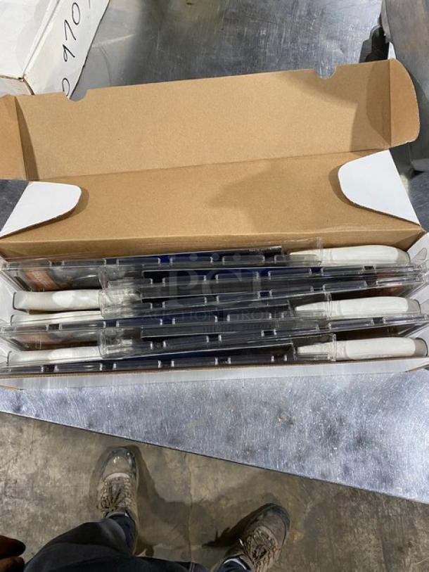 Dexter Russell SG145-10 Cook's Knife, brand new, 10" stainless steel blade, white SofGrip handle, in original packaging.