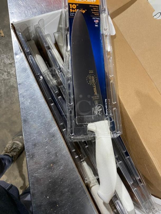 Brand new Dexter Russell SofGrip 10" cook's knife, model SG145-10, with white grip, in packaging.