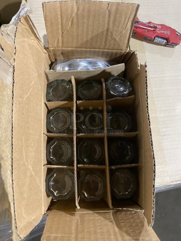 Box of Winco commercial clear 1 Oz. paneled glass shakers with mushroom tops, model G-105, in new condition.