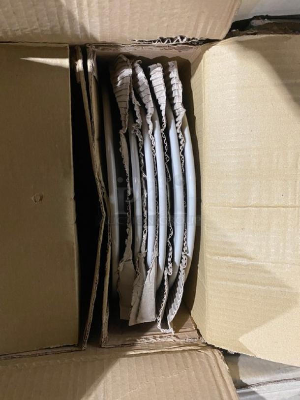 Mixed pallet with brand new World Tableware Libbey stoneware bowls, plates, demitasse cups, oval platters, and Winco glass shakers in open box.