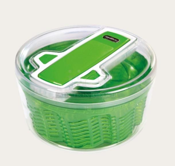Brand new Zyliss SwiftDry salad dryer, single-handed operation, green design, clear lid, commercial quality.