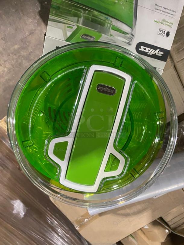Brand new Zyliss SwiftDry salad dryer in green, single-handed use design, commercial series, with original packaging.