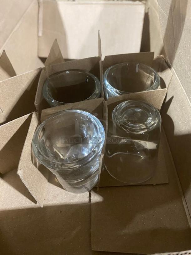 Mixed pallet with clear Libbey shot and rocks glasses in cardboard packaging. Brand new condition.