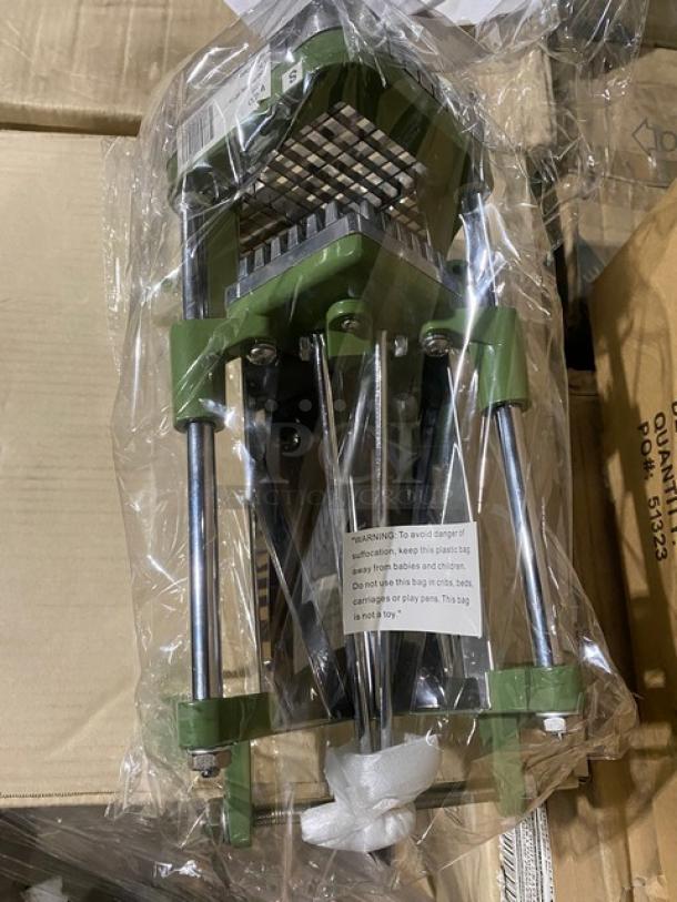 Brand new Winco commercial 3/8" French-fry cutter model FFC-375, cast iron, on legs, in packaging with safety warning label.