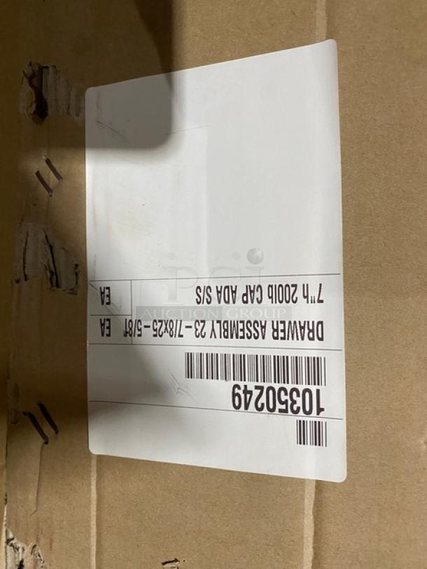 Brand new NBR TDR-2020 stainless steel drawer assembly in packaging. Label shows model and dimensions.