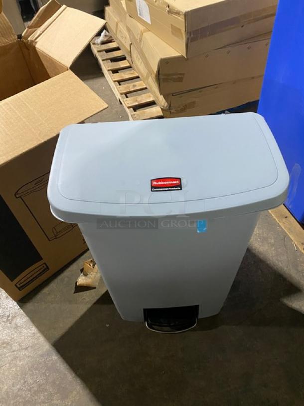 Rubbermaid Slim Jim 13 Gal. gray trash can, new condition, front step-on design, rectangular shape, commercial resin.