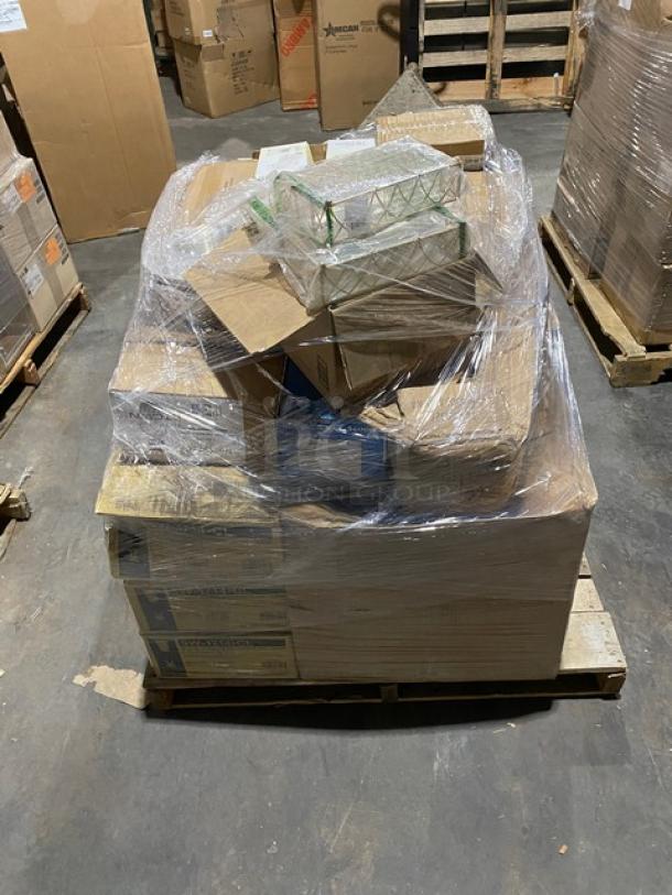 Mixed pallet of new commercial serveware, including beverage glasses, china plates, mugs, deli bags, bowls, cake stands, espresso saucers.