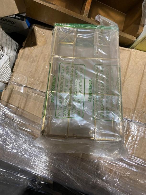 Mixed pallet with clear beverage glasses, plates, mugs, deli bags, bowls, and more. Each item in commercial packaging.