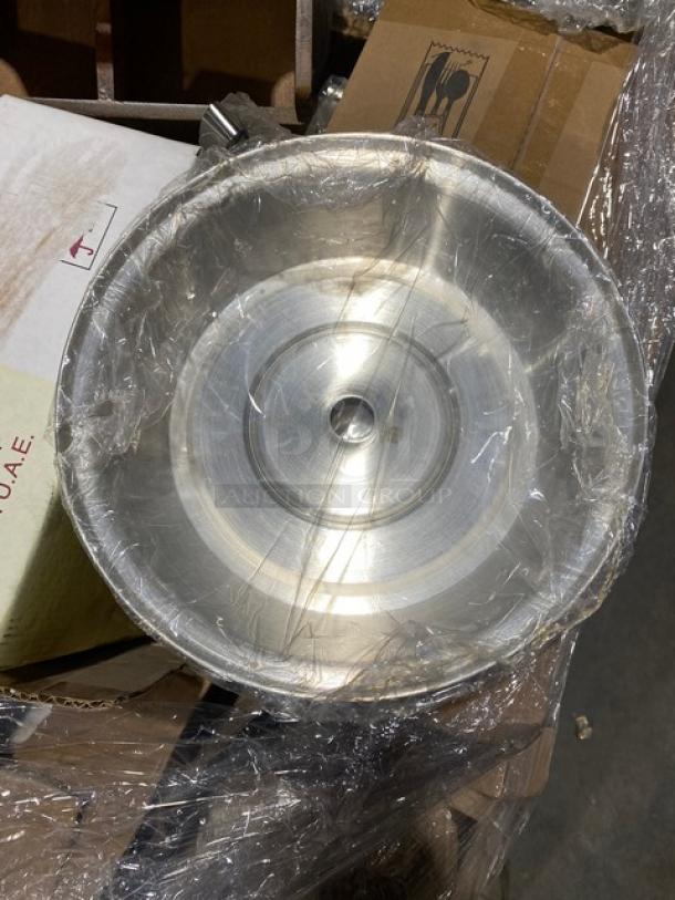 Mixed pallet with commercial serveware including a Stainless Steel 8.5" Hammered Bowl, wrapped in plastic, visible boxes.