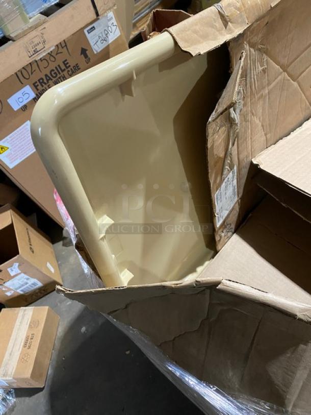 Pallet with mixed commercial glassware and dinnerware, including Chef & Sommelier wine glasses, visible in an open box.