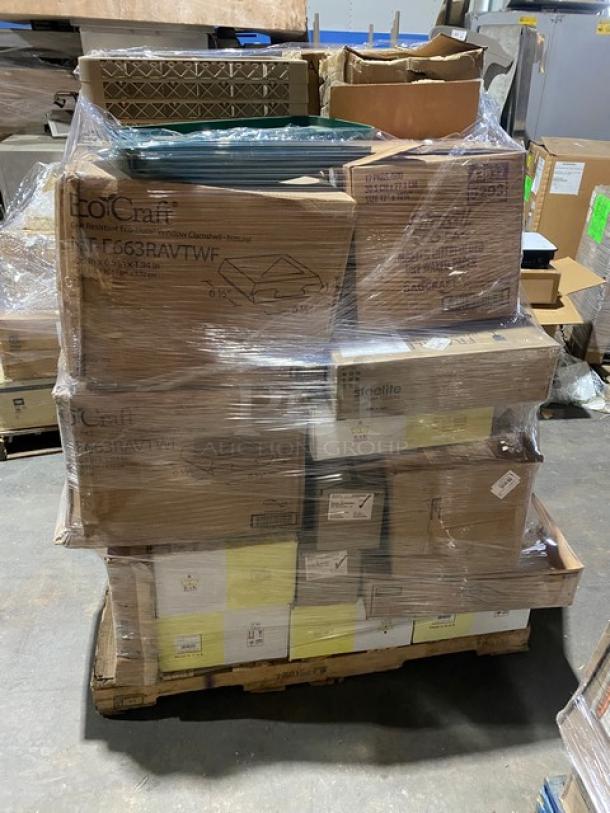 Mixed pallet of brand-new commercial items, including Rubbermaid recycling lid, Clipper Mill stainless steel basket, Winco cutting board, and Arcoroc beer glasses. Pallet wrapped and stacked with various boxes.