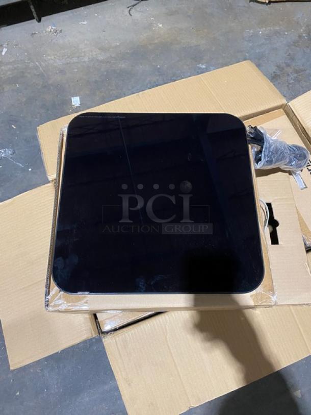 Brand new Spring USA SM-300CR countertop induction warmer, black, electric, 120V, shown in original packaging.