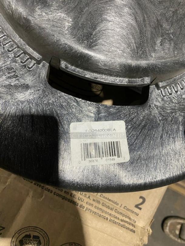 Rubbermaid BRUTE Series black trash can dolly, model FG264000BLA, brand new, on casters, with visible barcode label.