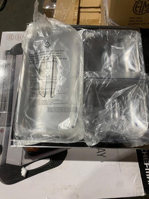 Brand new Chefman RJ22-SS-B buffet server and warming tray, 120V, in original packaging with visible labels.