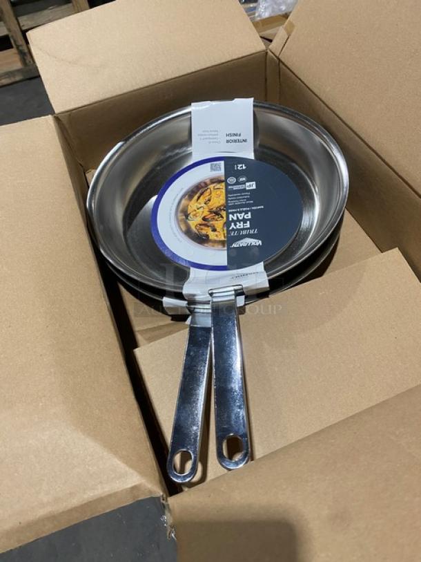 Brand new Vollrath Tribute Series 12" tri-ply stainless steel fry pan, model 691112, with plated handle.
