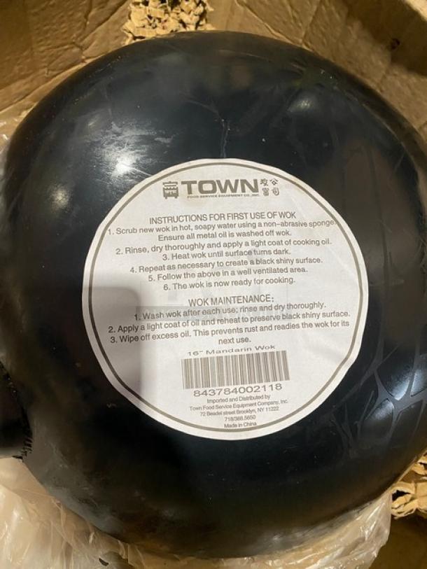 Brand new Town Commercial 16" Round Mandarin Wok with instructions and maintenance label, pristine condition.