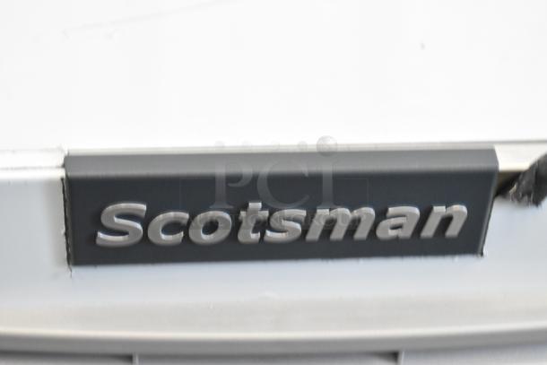 Scotsman logo on a stainless steel surface of the 2024 Scotsman MC1030MA-32A Prodigy Elite ice machine.