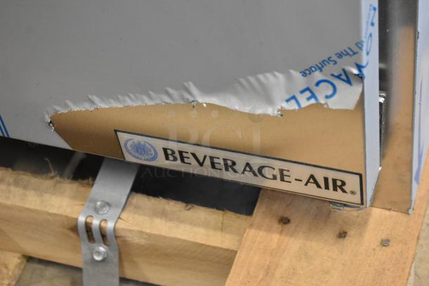 Brand new Beverage Air SPE48HC-12C with scratch and dent, visible on corner. Cutting top refrigerated prep table.