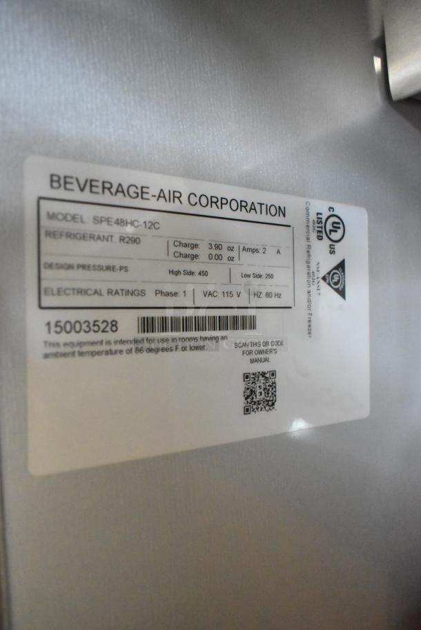 Label on Beverage Air SPE48HC-12C refrigerated sandwich prep table, showing model, refrigerant details, and electrical ratings.