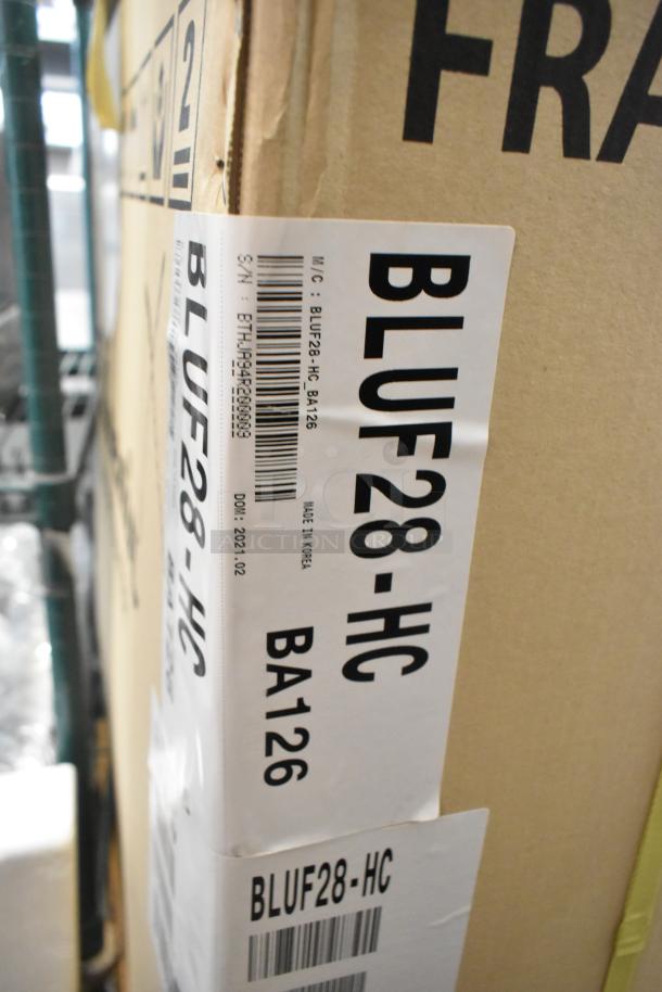 Boxed Blue Air BLUF28-HC stainless steel undercounter freezer. New, 115V, 1 Phase. Visible model label.