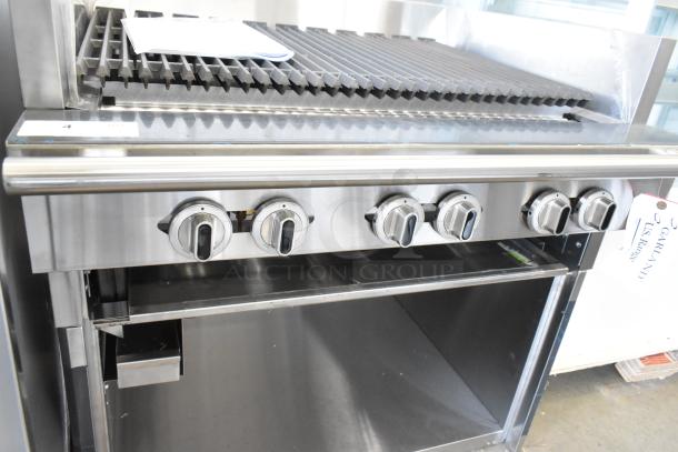 Brand new Garland C36-NRS stainless steel commercial charbroiler grill with under shelf, natural gas powered, minor scratches.