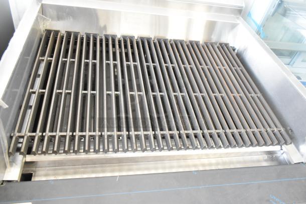 Brand new Garland C36-NRS stainless steel charbroiler grill, natural gas, scratch and dent, with under shelf.