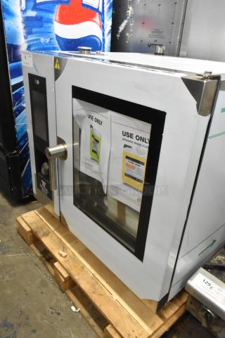 Bakers Pride AEHE061R stainless steel combi convection oven, electric, new with scratches, 208V, 3-phase, on pallet.