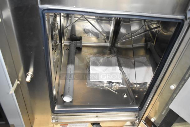 Bakers Pride AEHE061R stainless steel combi convection oven, brand new with scratch and dent. 208 volts, 3 phase.