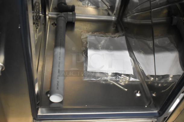 BRAND NEW Bakers Pride AEHE061R stainless steel commercial electric combi convection oven interior, showing pipes and packaging.