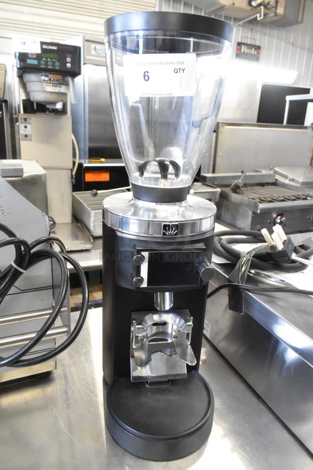 Brand new Mahlkonig E65W GBS black espresso grinder. Scratch and dent condition. Grind-by-Sync technology, 2.6 lb. capacity.