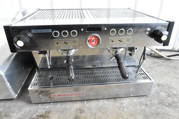La Marzocco N/21 2 AV stainless steel espresso machine, 2 group, 2 portafilters, 2 steam wands, 208-240V, 1 phase.