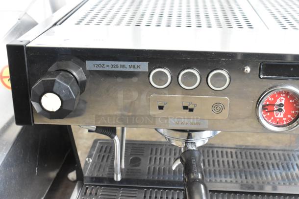 La Marzocco N/21 2 AV stainless steel espresso machine with 2 portafilters, steam wands, and milk label. 208-240V, 1 phase.