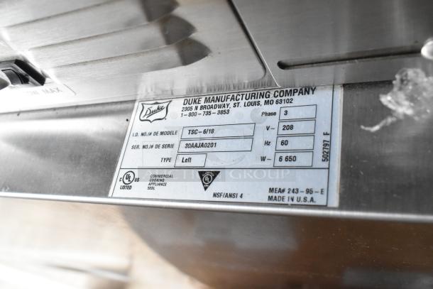 Duke TSC-6/18 stainless steel electric oven proofer spec label; 208V, 3-phase, commercial use.