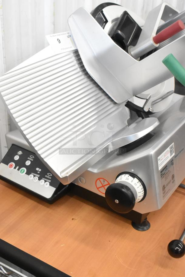2023 Bizerba GSP HD meat slicer, commercial countertop model, 115 volts, 1 phase. Features control panel and adjustment knob.