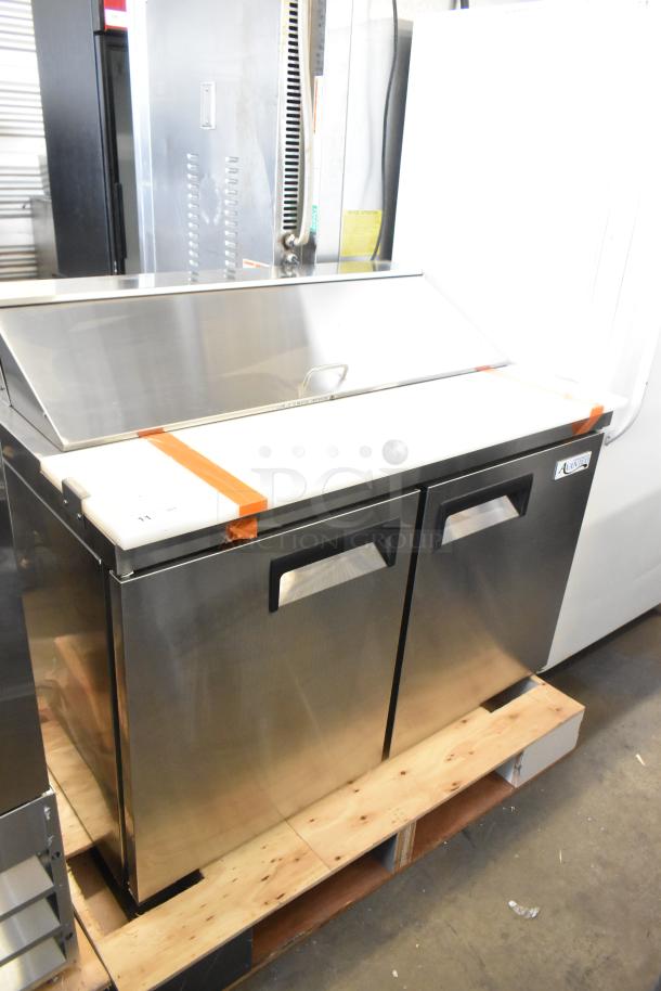 Brand new Avantco 178APT48HC stainless steel salad prep table, scratch and dent, 115V, 1 phase, mega top bain marie.